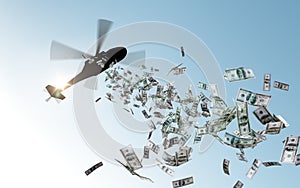 Helicopter dropping money in sky