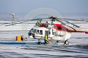 Helicopter engine repair on the airport apron