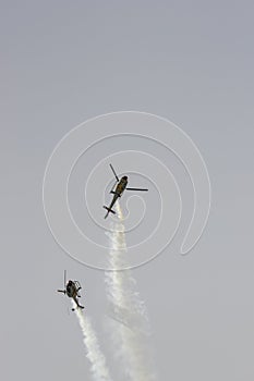 Helicopter Eurocopter Colibri from the Patrulla Aspa patrol flying during the spanish airshow Festival Aereo Internacional AGA 75, photo