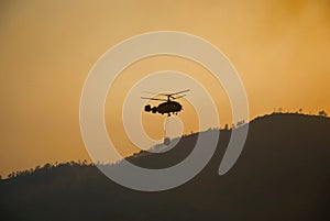 Helicopter fighting fire