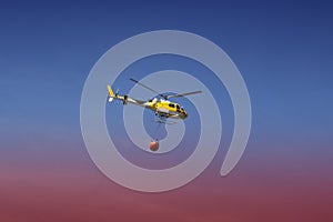 Helicopter fighting fire