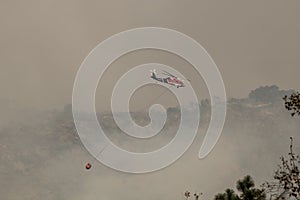 Helicopter Flies Over Fire and Smoke in California