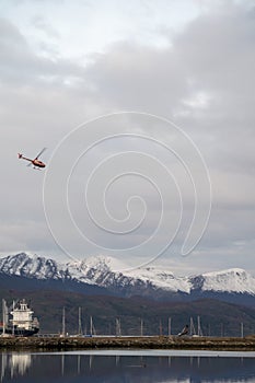 Helicopter flight over the city of Ushuaia. Land of Fire.