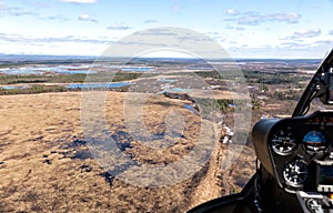 Helicopter flight over the river. The control panel of helicopter