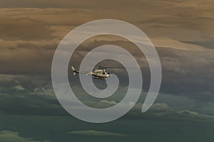 Helicopter flight through winter sky