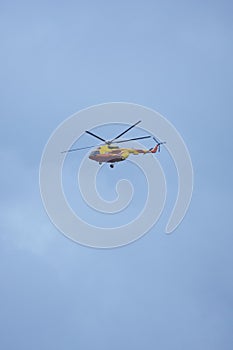 Helicopter Flight yellow windship in the blue sky
