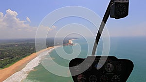 Helicopter fly over the ocean beach