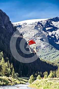 Helicopter flying through a valley, Monterosa