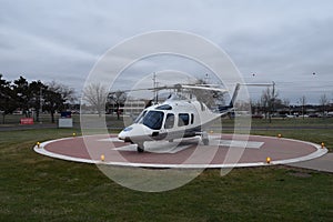 Helicopter On Helipad With Medic Sign