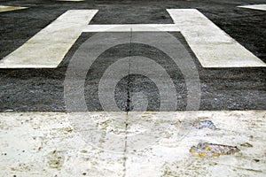 Helicopter helipad with white marker
