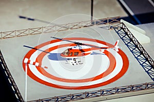 Helicopter on heliport photo
