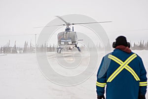 Helicopter Landing at Airport in Snowy Location