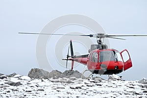 Helicopter landing on the mountain
