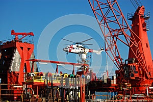 Helicopter landing on a Semi submergible rig.