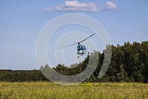 Helicopter MI-2 flying