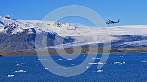 Helicopter over ice lake in Iceland