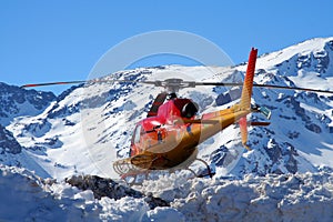 Helicopter over snowy img