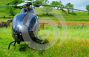 Helicopter parked on field