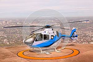 Helicopter parking on building roof top use for commercial air t