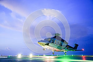 Helicopter parking landing on offshore platform. Helicopter transfer crews or passenger to work in offshore oil and gas industry