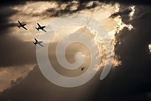 Helicopter and planes in stormy sky