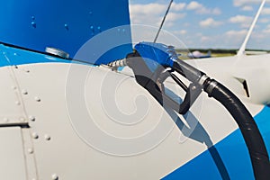 The helicopter is refueling on the helideck.