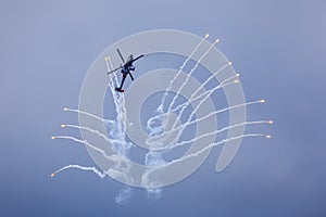 Helicopter releasing flares