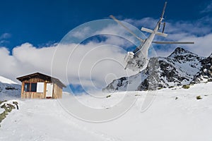 Helicopter on a ski slope in Gressoney Ski Resort, Monterosa, Italy.