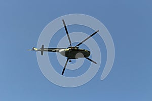 Helicopter in sky. Air transport flies across sky. Flight details
