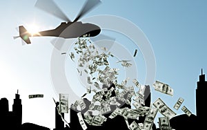 Helicopter in sky dropping money over city