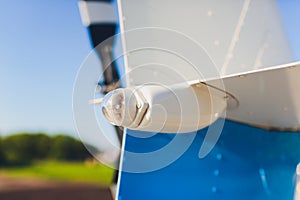 Helicopter tail rotor selective focus or Tail rotor of transport helicopter under hangar background.