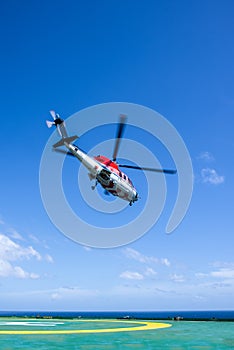 Helicopter take off from oil rig