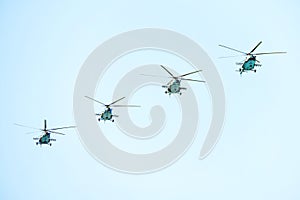 Helicopters in the blue sky