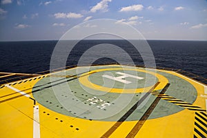 Helideck of oil and gas drilling rig in offshore industry, Helicopter landing area on construction platform in offshore