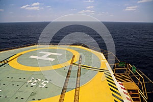 Helideck of oil and gas drilling rig in offshore industry, Helicopter landing area on construction platform in offshore