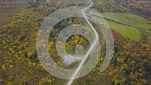 Helipad area for parking on forest near road. Clip. Top view on helipad in a wooded area