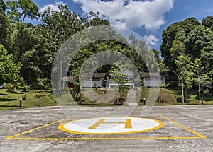 Helipad for helicopter landing surrounded with lush green jungles