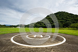 Helipad in the park with mountains