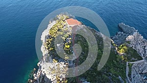 Helipad on a rocky island. Aerial view