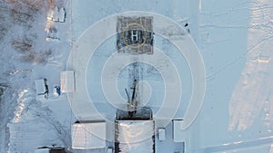 Helipad snowy field surrounded by forest northern solitude Helipad symbol air mobility frosty nature. Helipad connecting