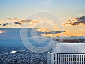 Helipad on a tall building view and beautiful aerial view with tall buildings and blue sky sunlight