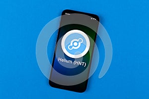 Helium HNT symbol. Trade with cryptocurrency, digital and virtual money, banking with mobile phone concept. Business