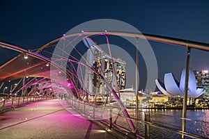 Helix bridge pink light up at Marina Bay, Singapore