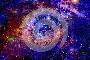 The Helix Nebula in deep space. Elements of this image furnished by NASA