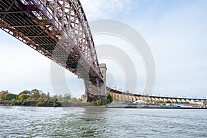 Hell Gate Bridge connecting Astoria Queens New York to Wards and Randall`s Island photo