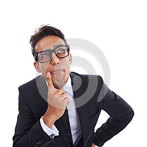 Hell give it some thought. A geeky businessman holding his finger to his cheek in a thoughtful gesture against a white