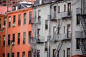 Hell`s Kitchen, New York City, typical traditional apartment buildings
