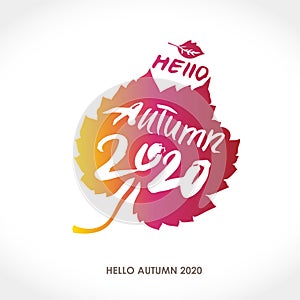 Hello Autumn 2020. Seasonal poster. Calligraphy on the background of a yellow brown autumn leaf.