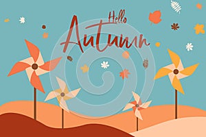 Hello autumn background with colorful pinwheels. Turbine, page.