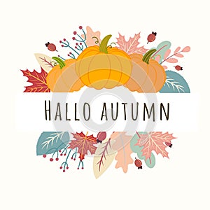 Hello Autumn Inscription over wreath of orange pumpkins, berries and fallen leaves
